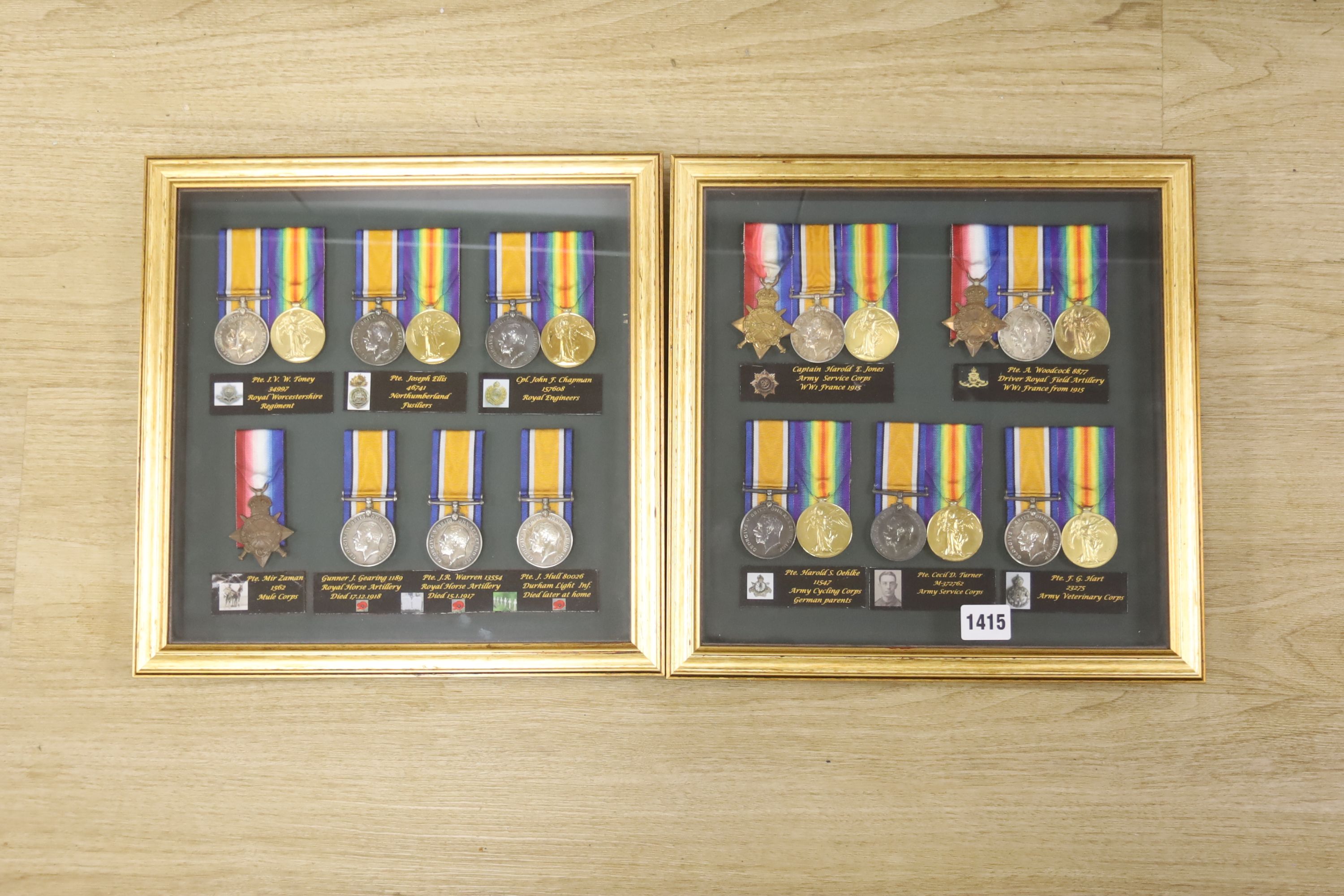Two framed collections of WW1 medal groups